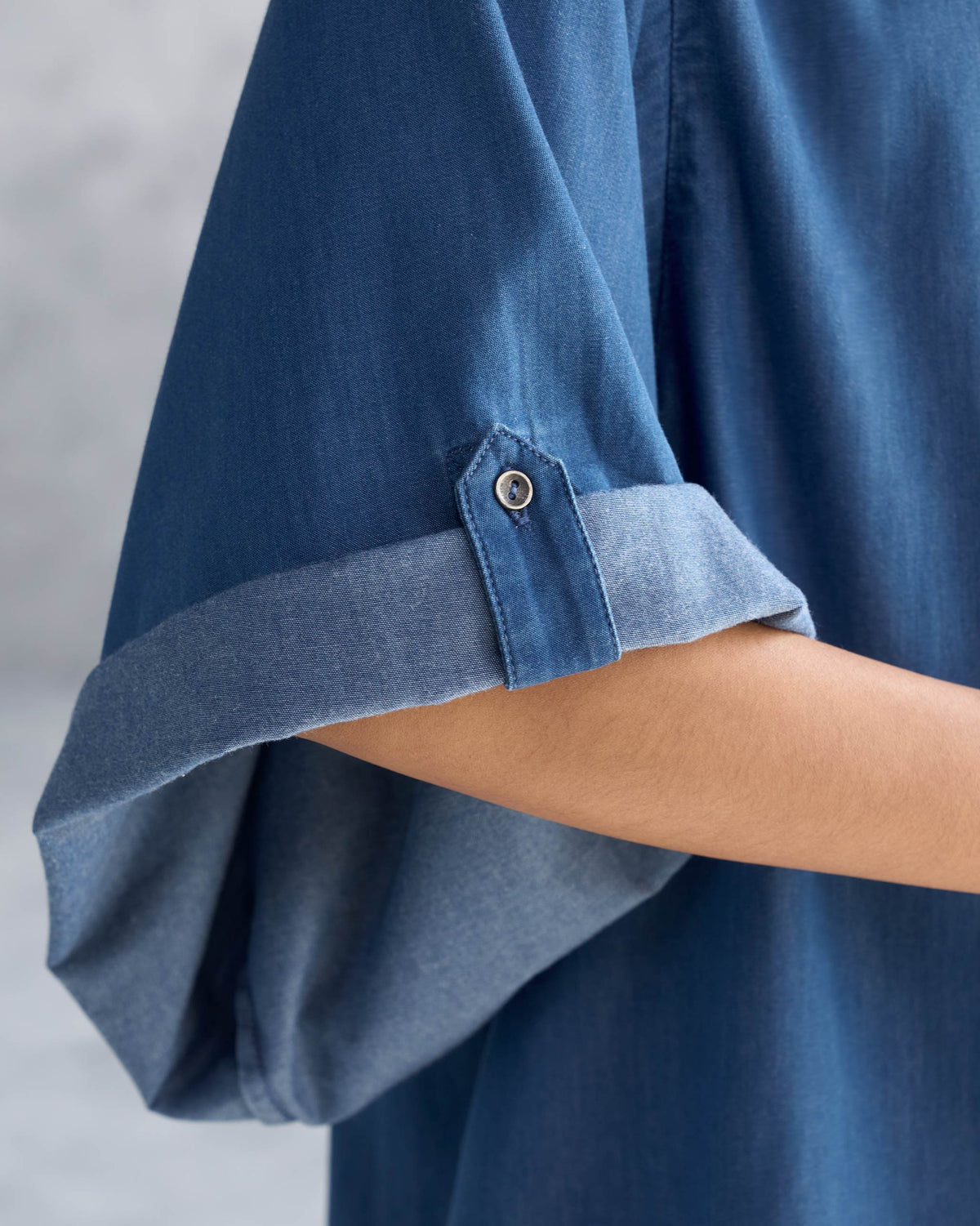 Close-up of the Drop Armhole Shirt sleeve cuff with a tab and button.