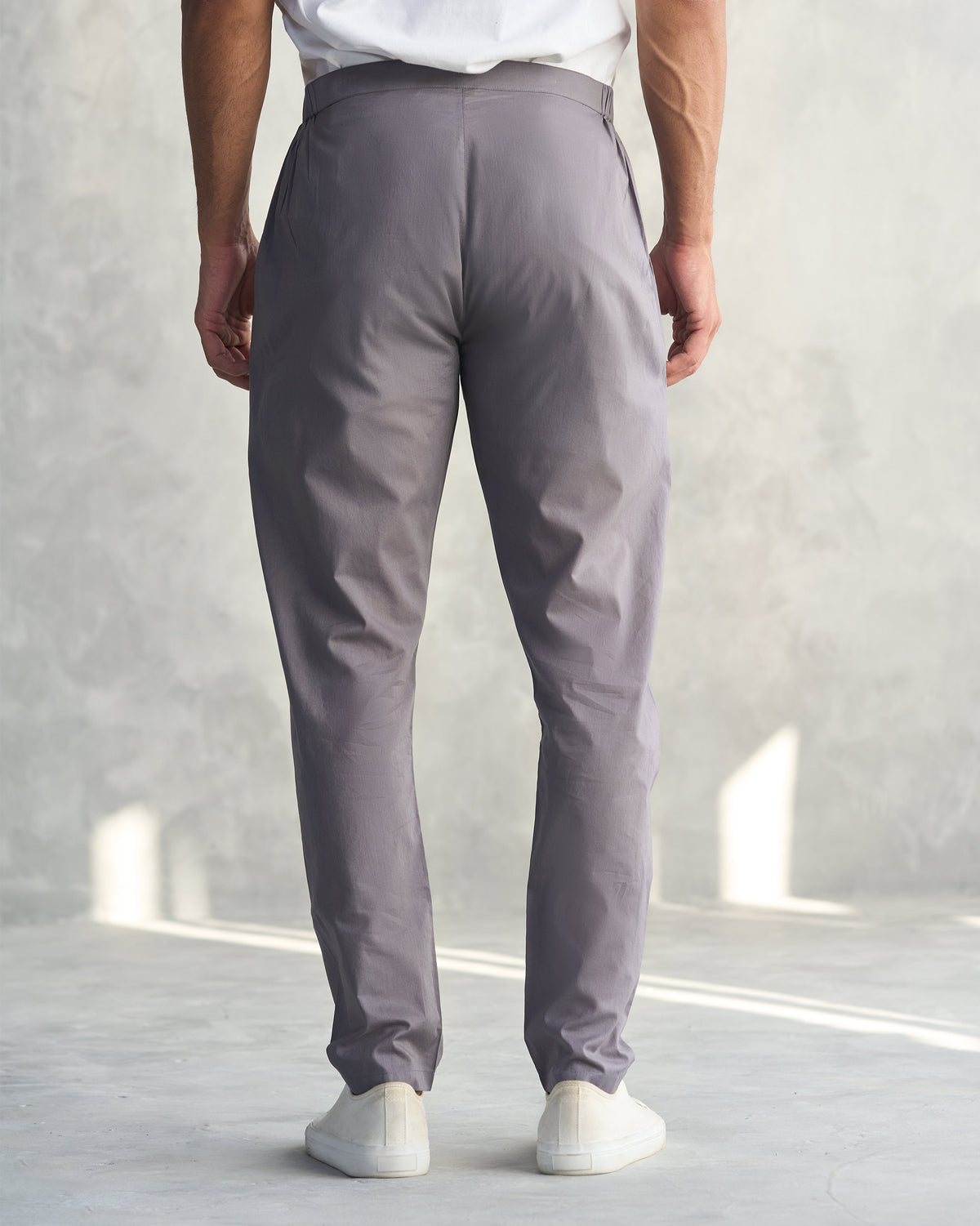 Back of charcoal Kurta Pants with a tapered ankle fit.