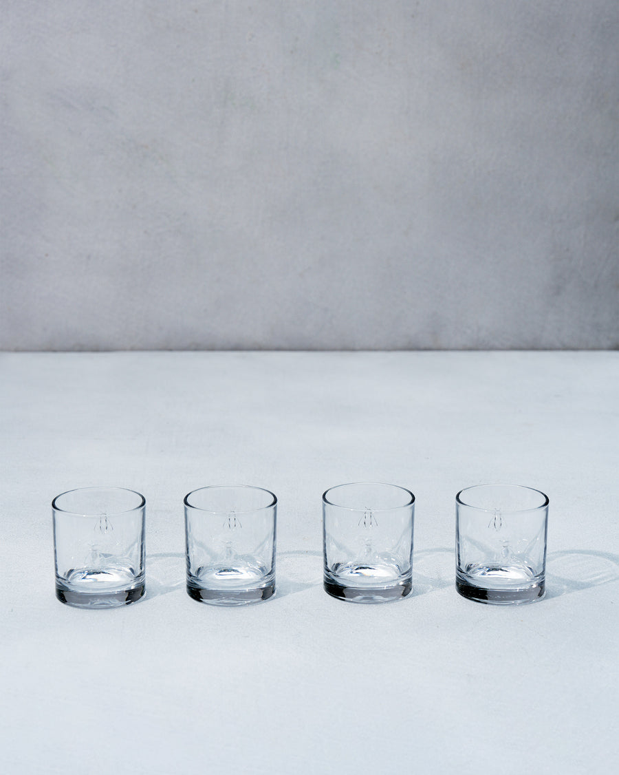 Four Bumble Bee glasses in a row