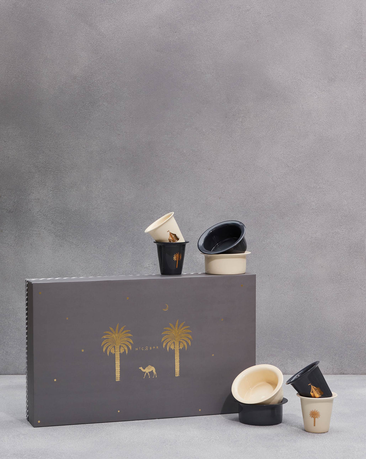 Sahara filter coffee set with cups stacked on its grey box.