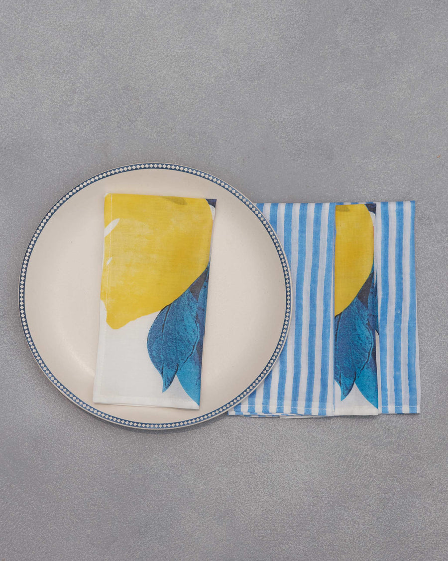 An Azraq napkin beside a plate.