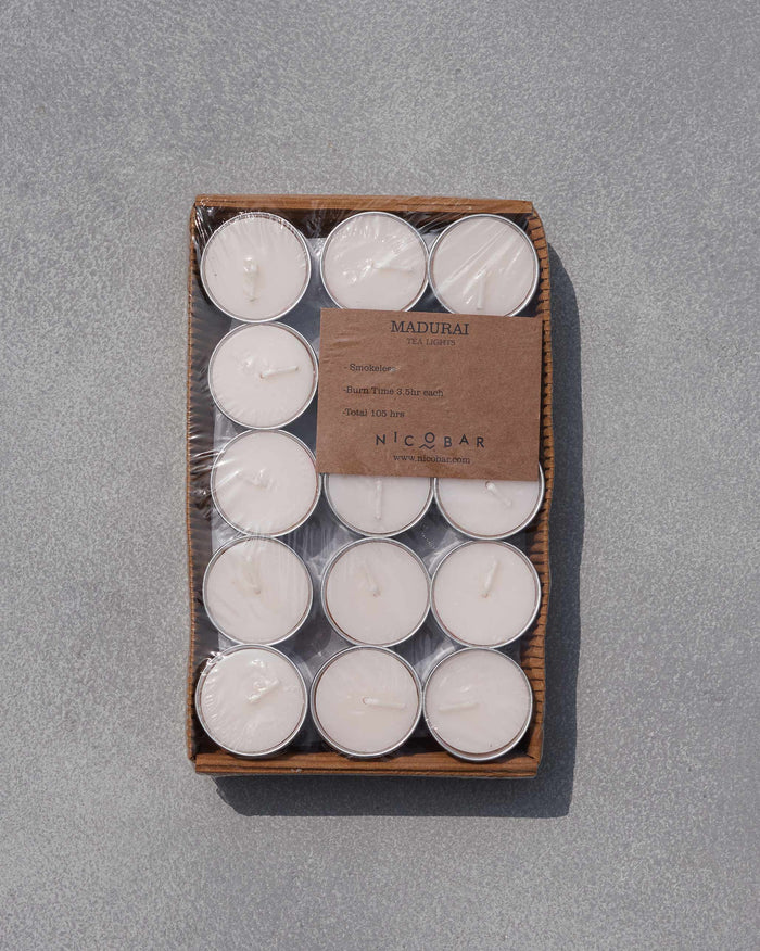 Pack of Madurai tealights in silver cups sealed in a cardboard tray.