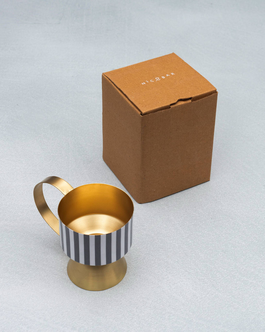 The dhuna beside its kraft box.