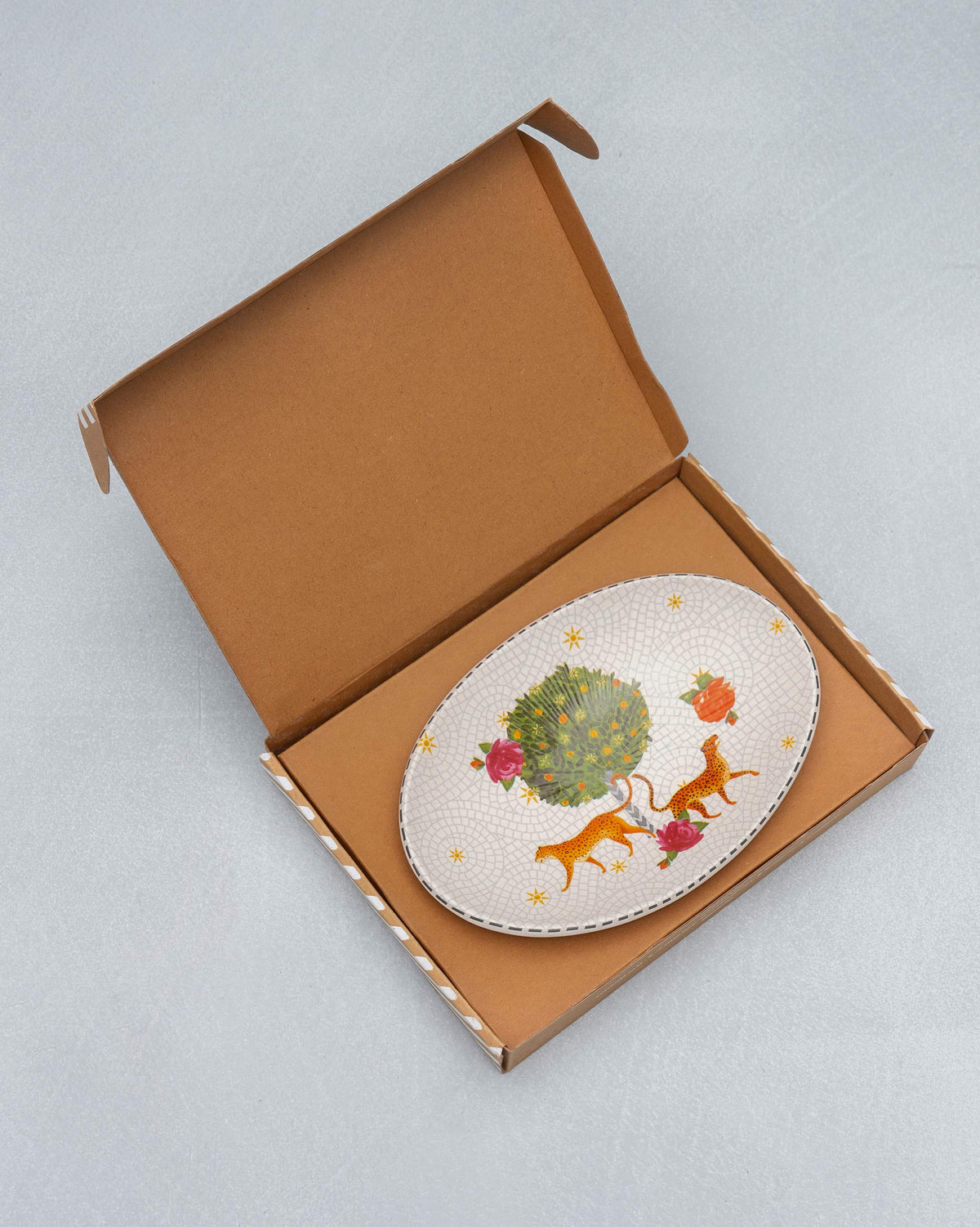 Mirage oval platter packed in an open Nicobar box.