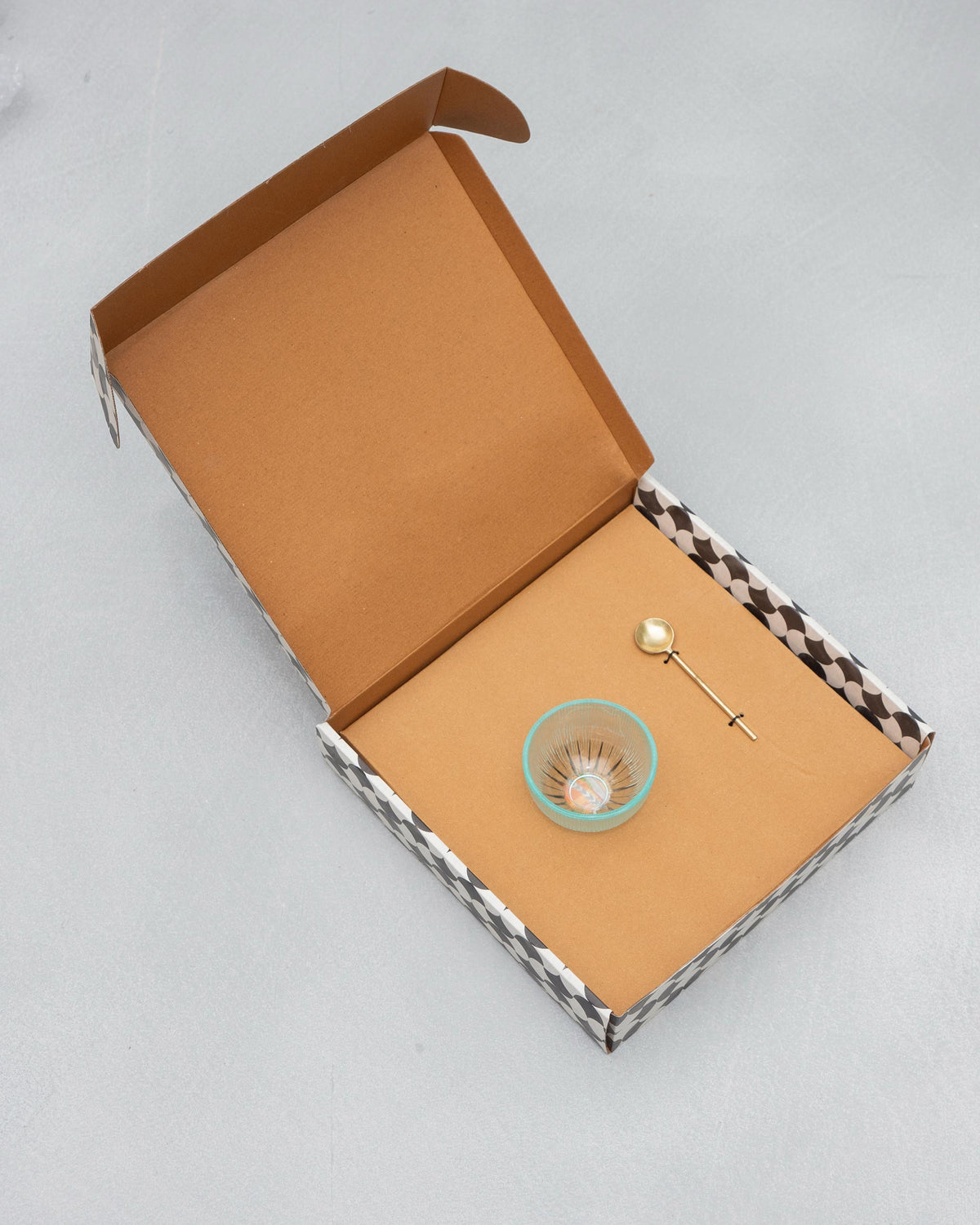 Teal dip bowl and gold spoon from the Mirage platter set in gift box.