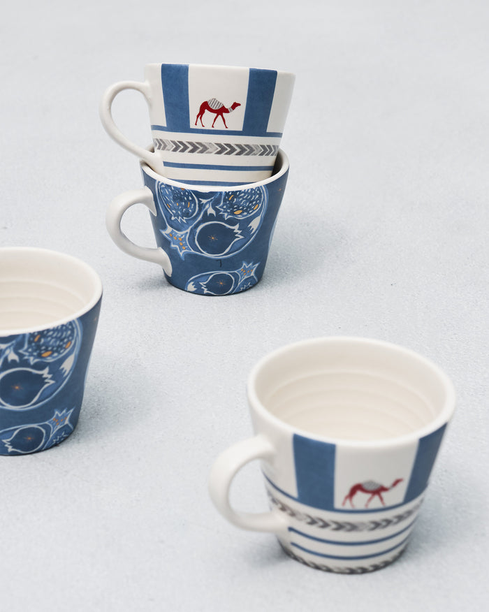 Mugs grouped, camel stripes and indigo pomegranates