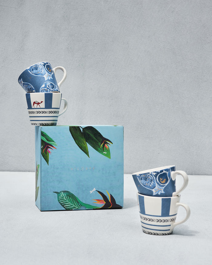 Desert Trail Espresso Mugs with camel and pomegranate prints on a gift box.