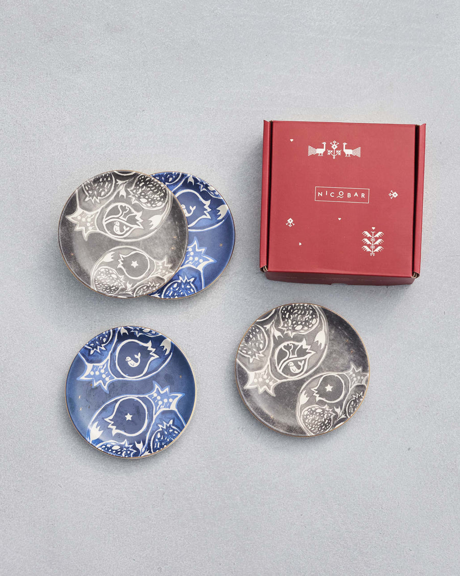 The plates beside their red box.