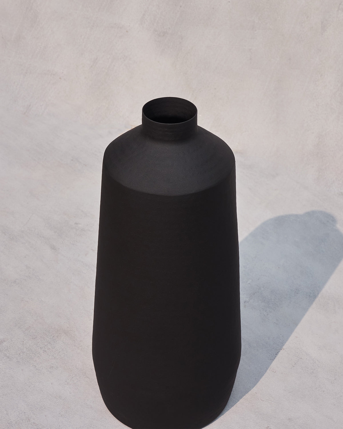 Overhead angle of Nadi Vase - Large showing its narrow neck.