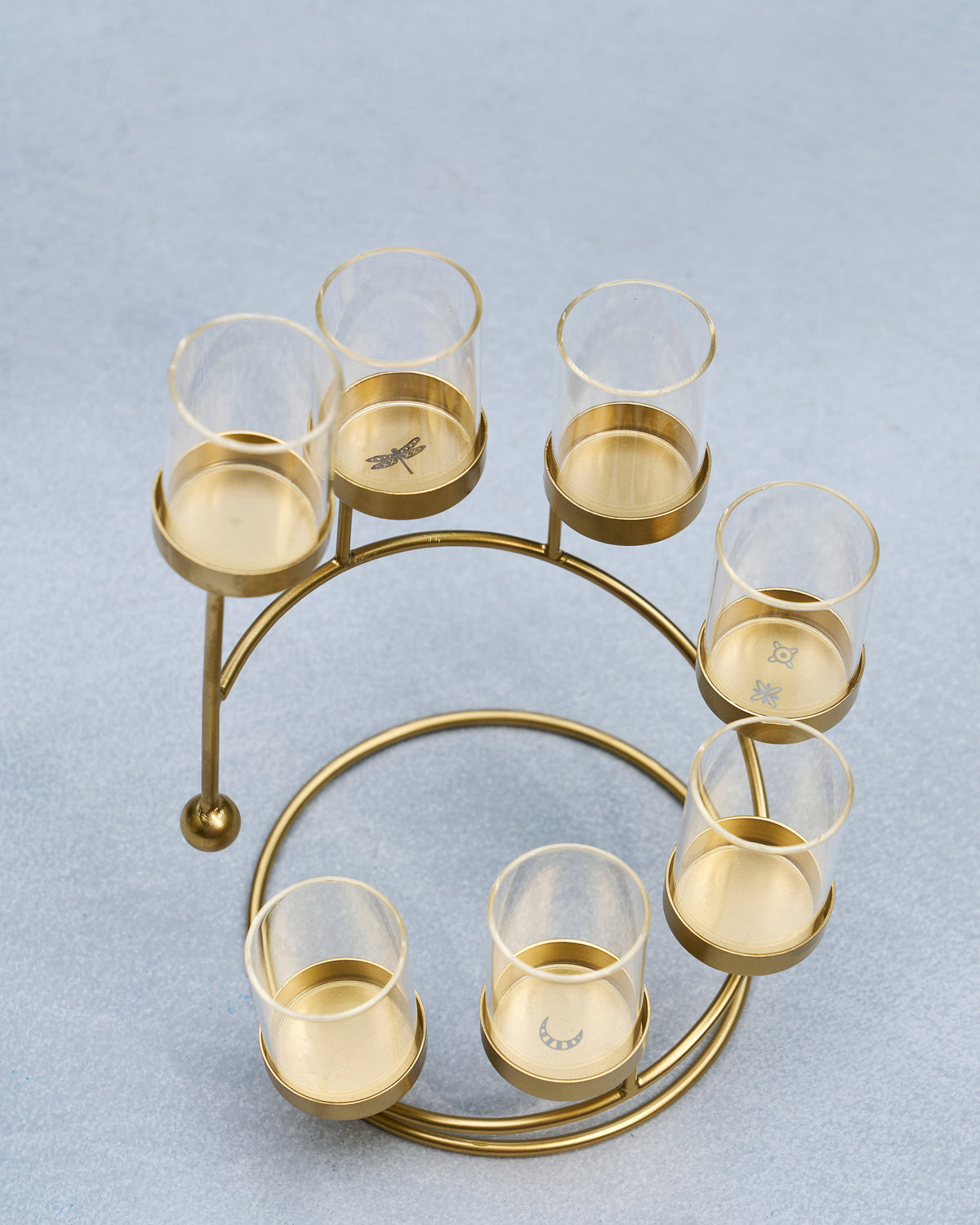 Amaryllis Tealight Holder seen from above, with small engraved motifs on the cup bases.