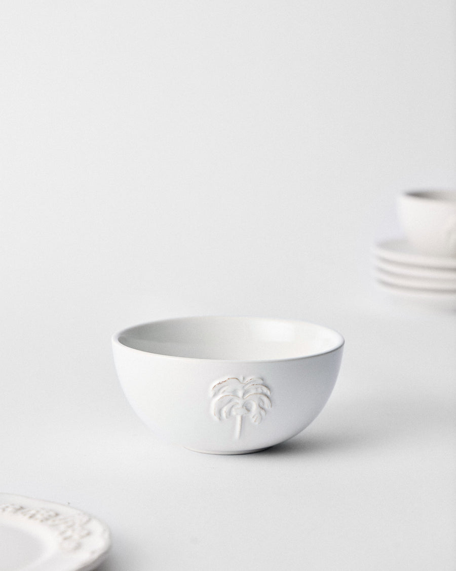 The Ele Palm Cereal Bowl on a table.