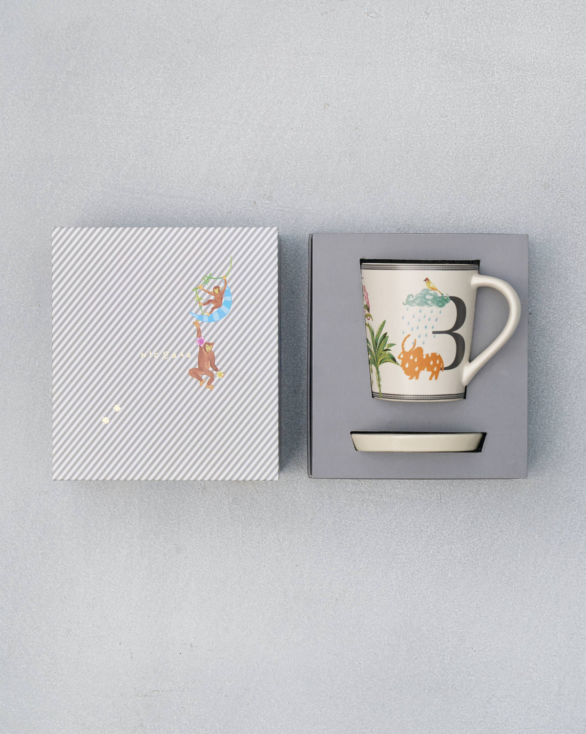 B Alphabet set packed in its gift box with mug, saucer and striped lid.