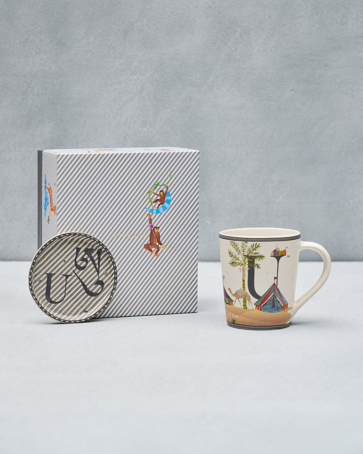 U alphabet set with mug, coaster, and Nicobar gift box.