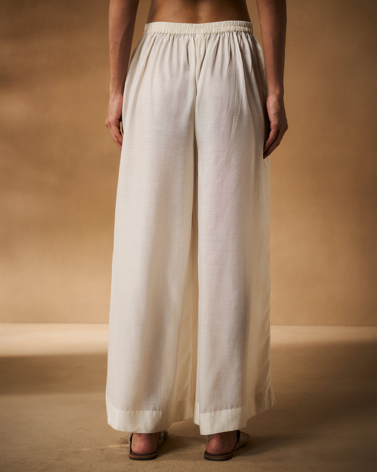 Back of ivory Basic pyjamas with an elastic waist.
