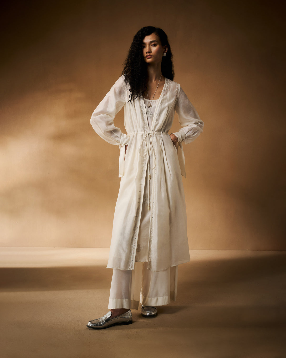 Person wearing ivory Basic pyjamas with a wide-leg fit.