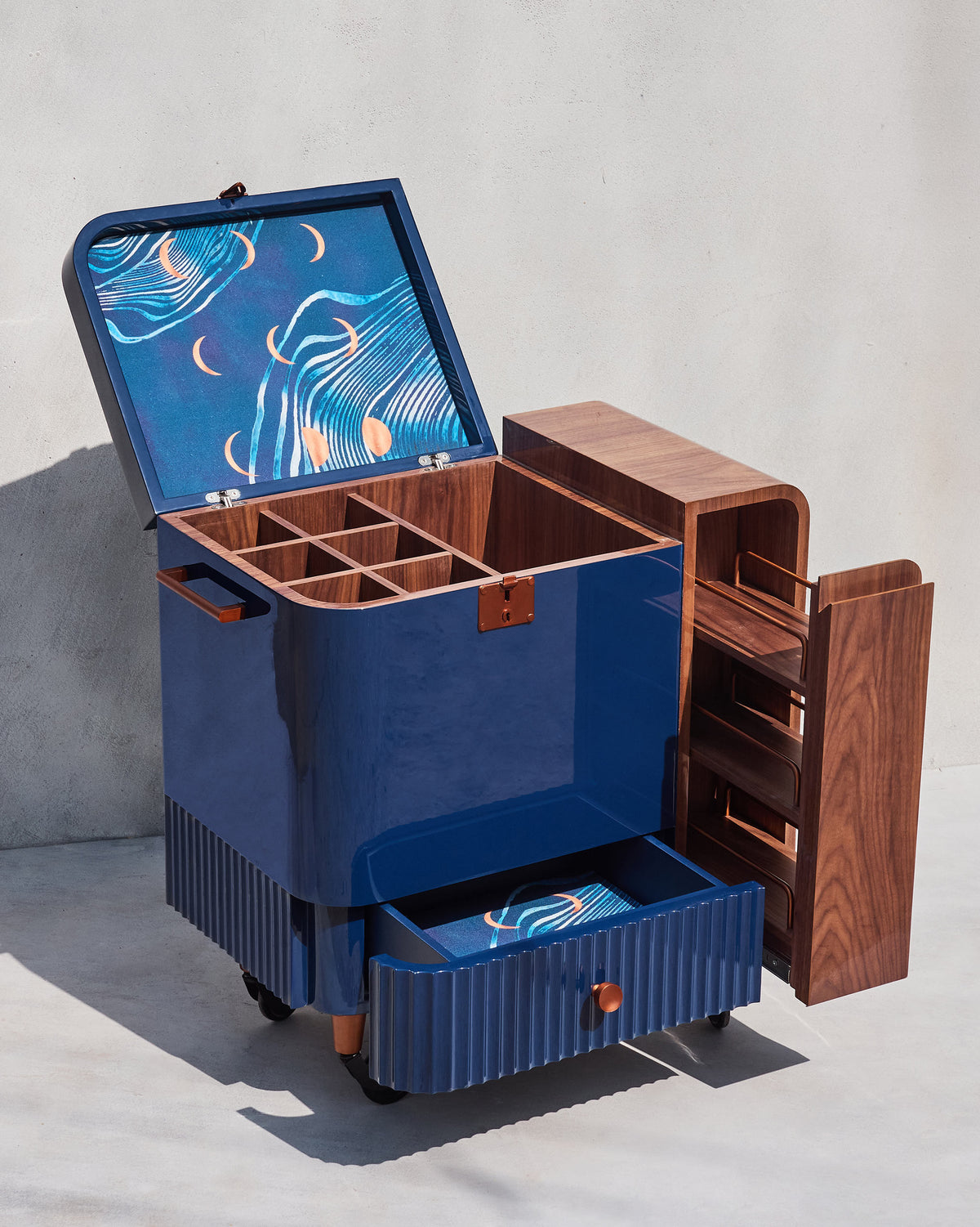 Contours of Time trolley fully open with cubbies, drawer, and side rack.