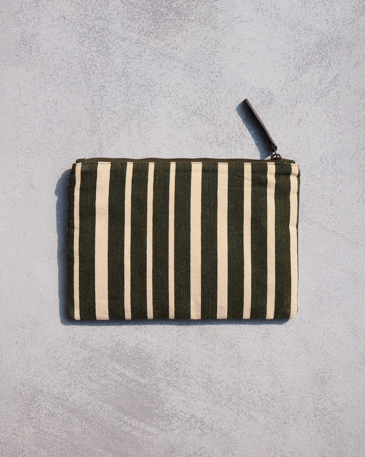 Back of the Alphabet S Pouch in olive and cream vertical stripes.