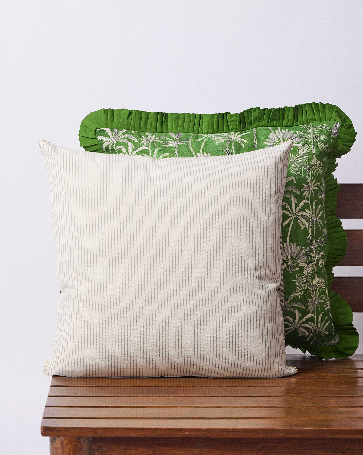 Back of a Ceylon Ele cushion cover with fine cream vertical stripes.