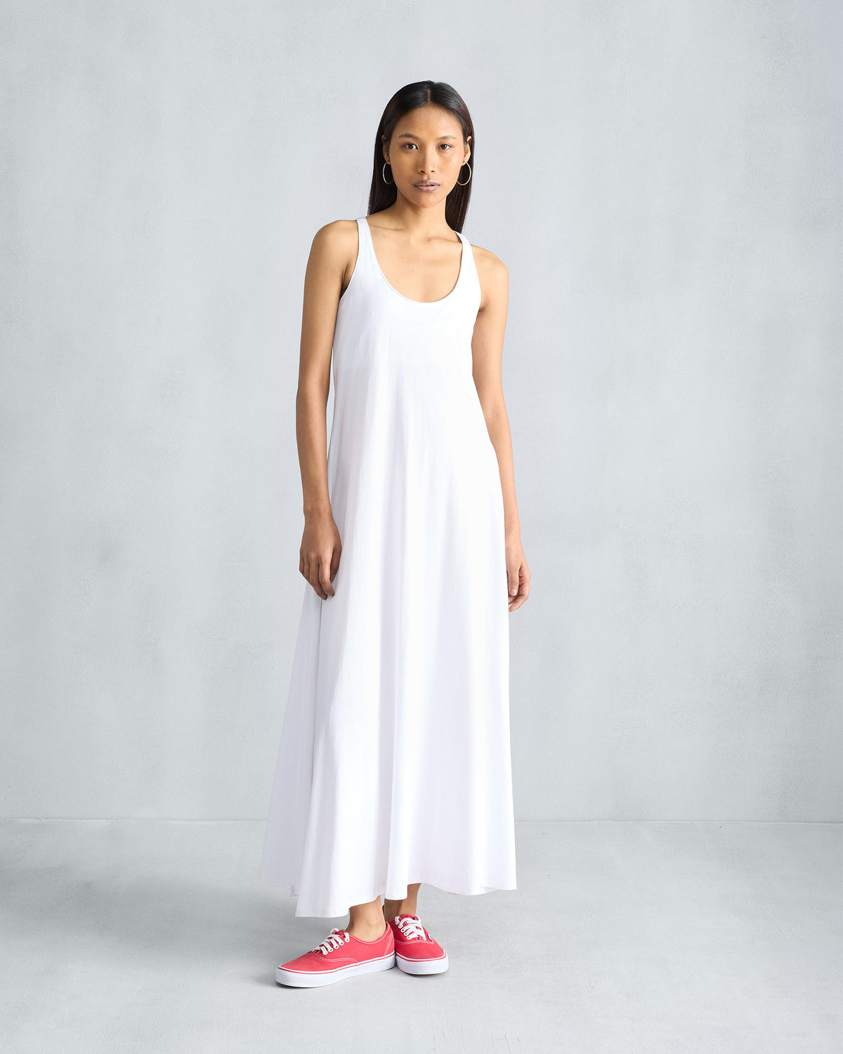 Full view of a white Esther dress with a flared A-line silhouette.