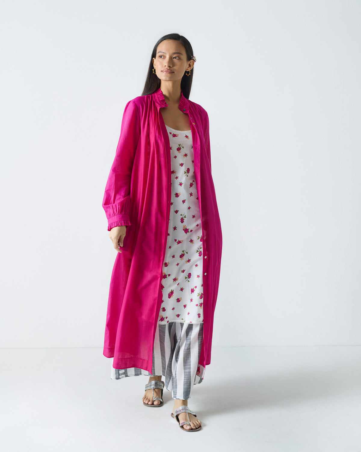 White fuchsia-print Vintage Camisole worn under an open pink jacket.