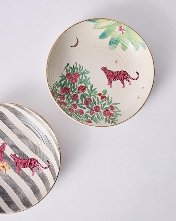 A cream bowl with red blossoms, leaves, a tiger and a crescent moon
