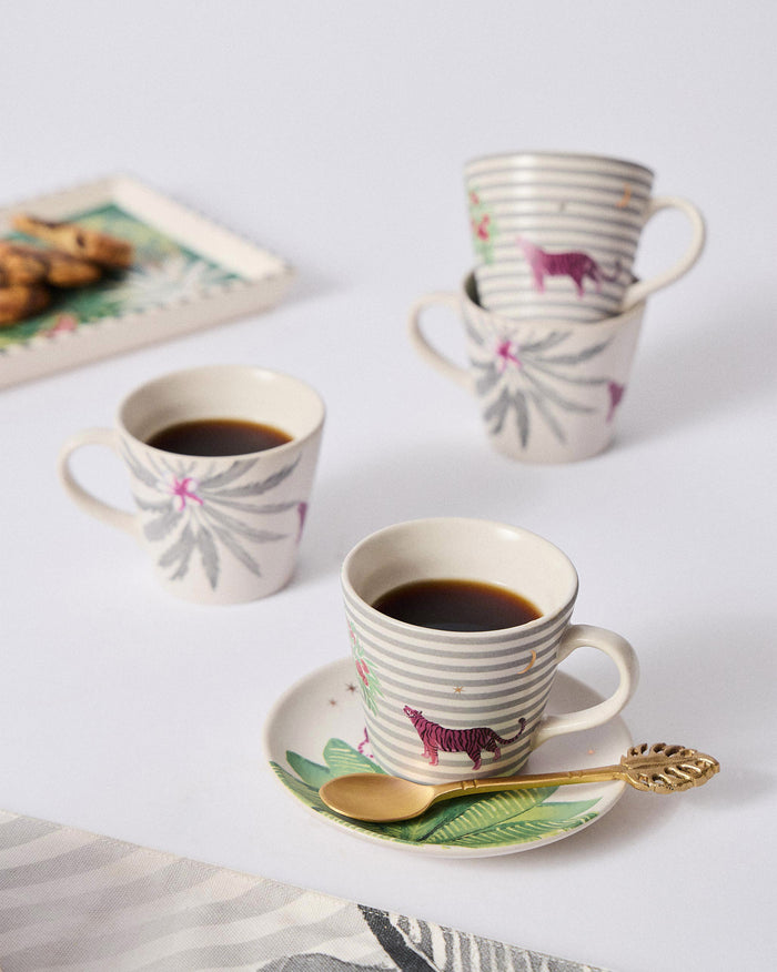 Ceylon Trail Espresso Mugs with pink tiger and palm prints beside coffee.