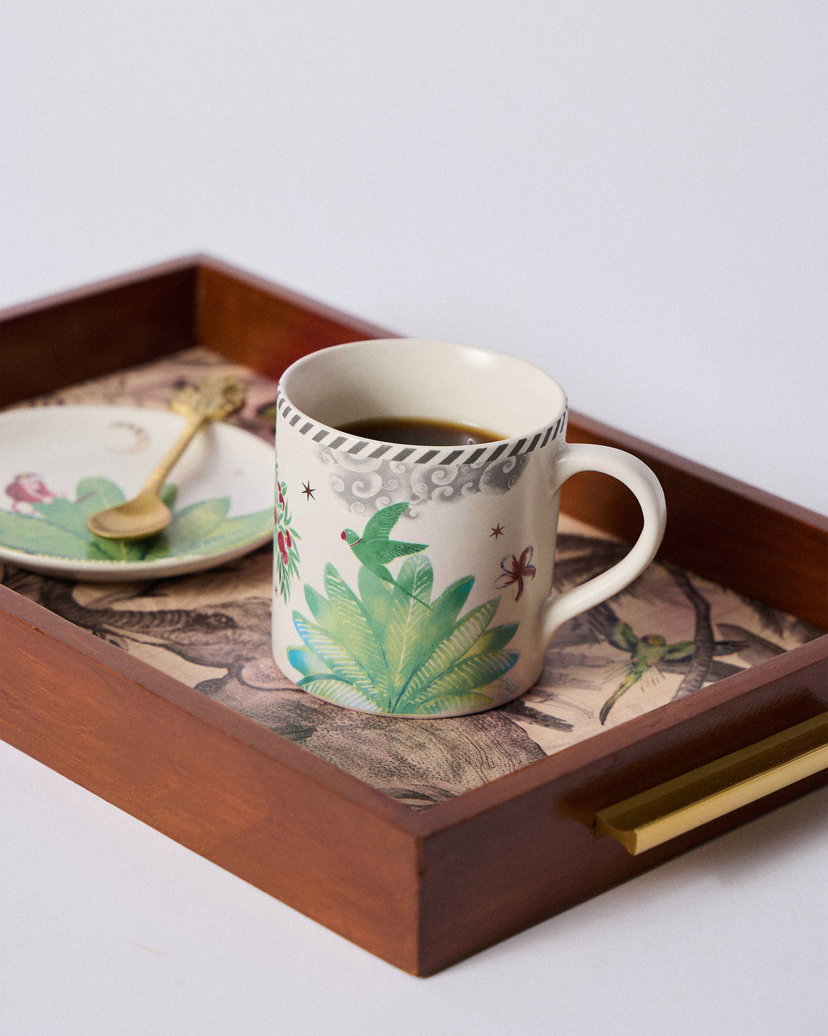 The Ceylon Lush mug on a tray.