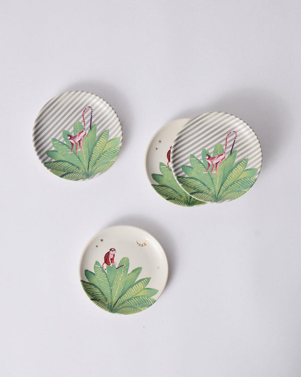 Plates scattered, cream and striped grounds