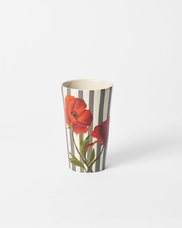 The mug showing intertwined poppies
