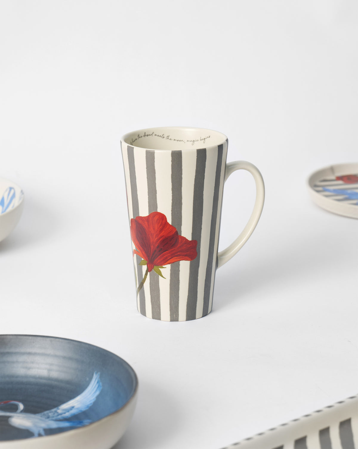 Striped Poppy tall mug with grey stripes and a large red poppy.