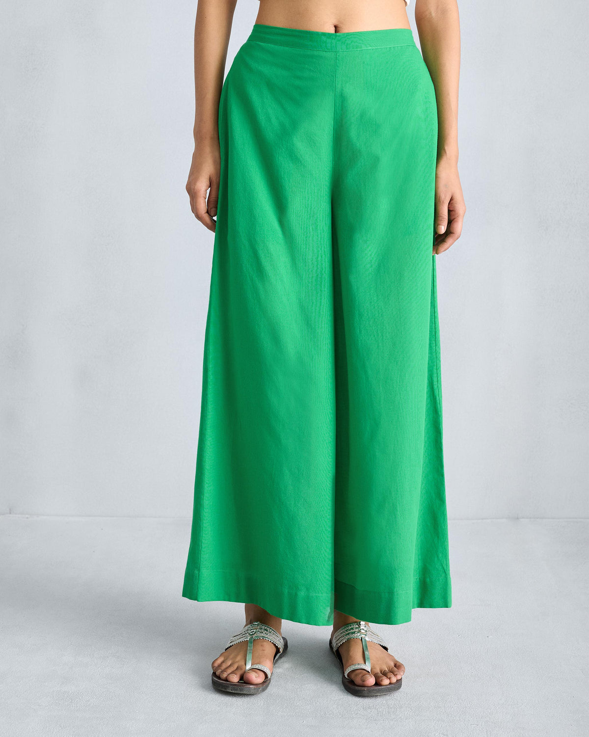 Bright green wide-leg pyjamas with a clean waistband and ankle-length flare.