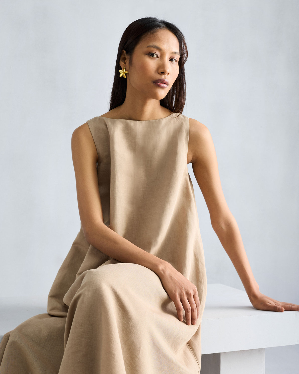 Beige Double Layer Dress with a sleeveless boat neckline.