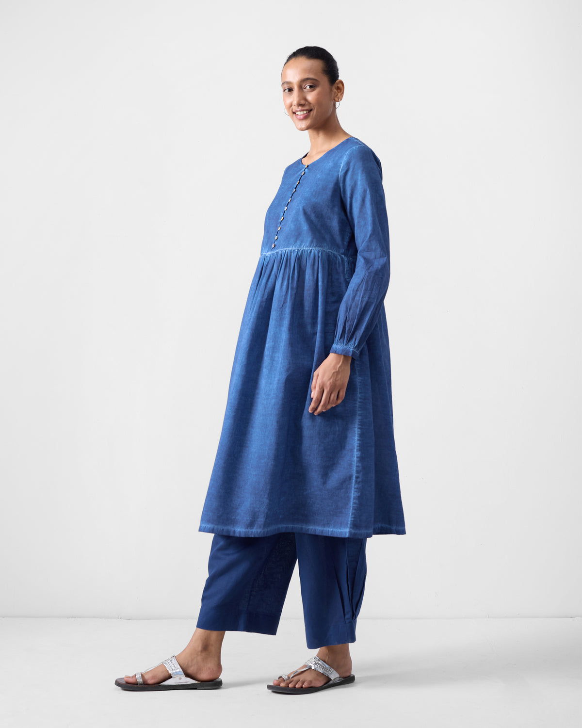 Blue Geisha Kurta with a gathered waist and flared skirt.