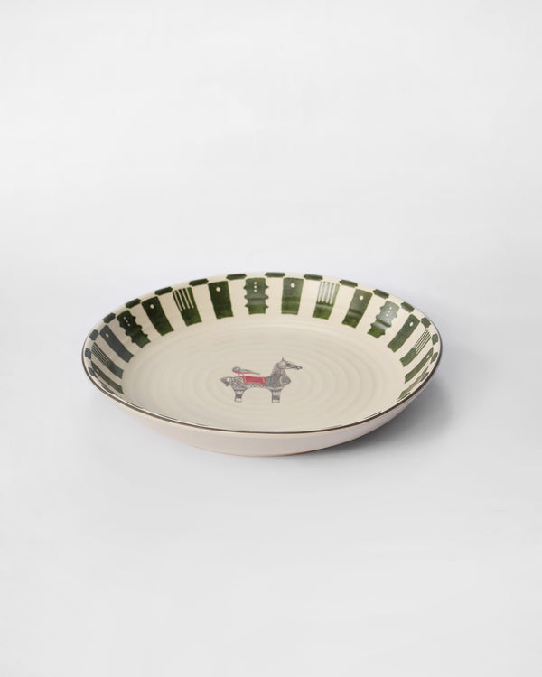 The plate side-on, showing its depth