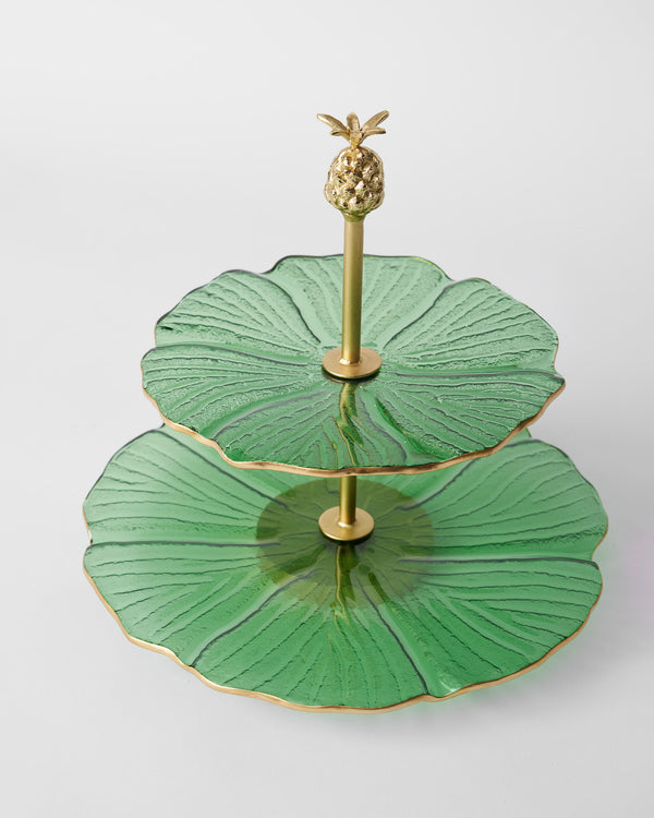 The stand at an angle, both tiers and the pineapple finial