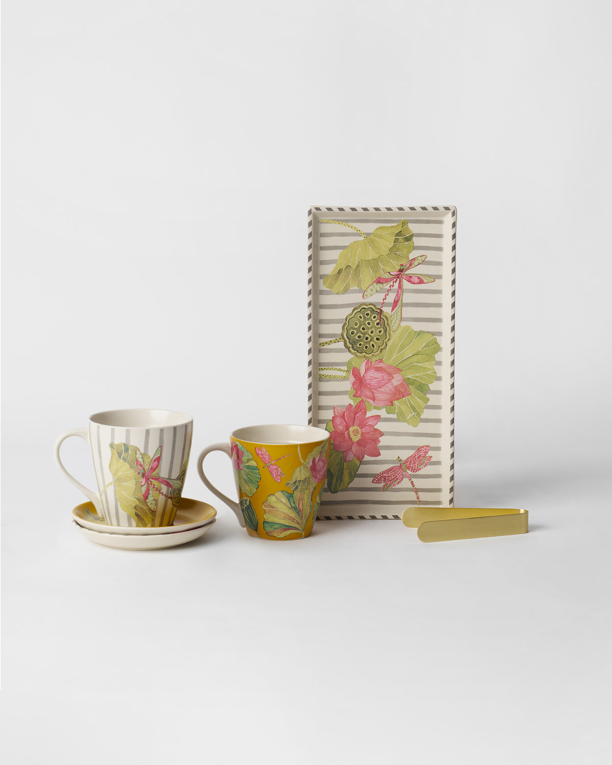 Lotus Garden mugs, tea plates, lotus tray, and gold tongs.