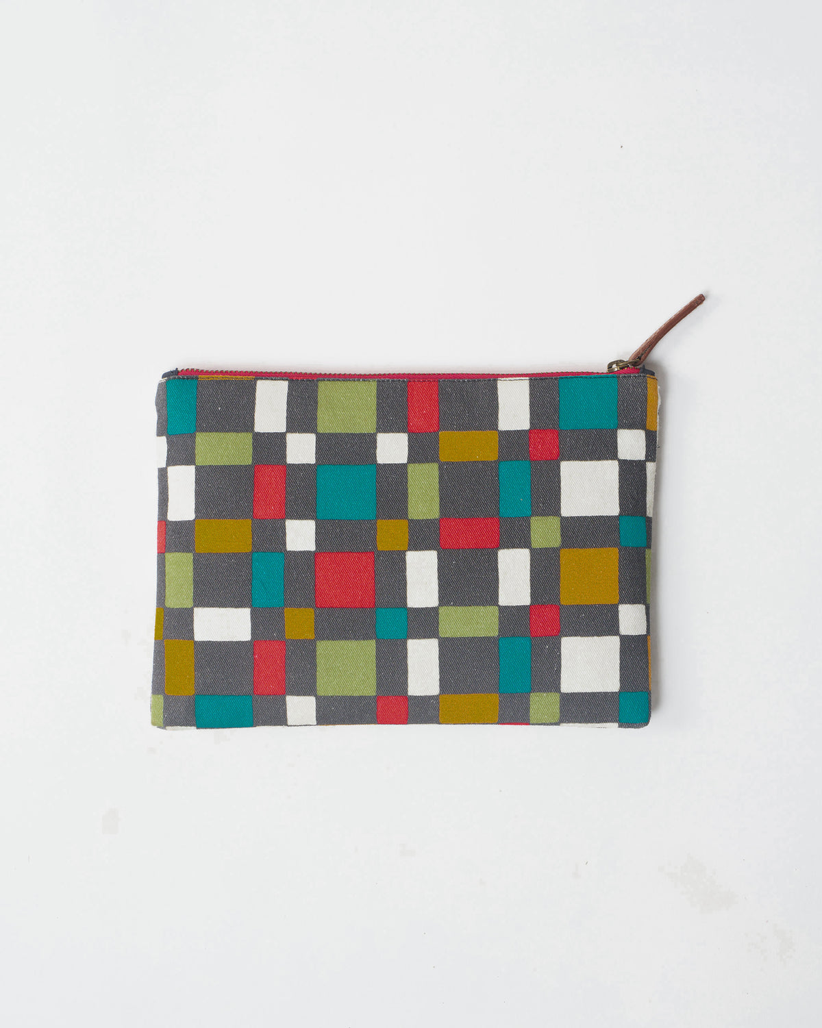 Multicolor Abstract Heart Pouch showing the abstract geometric print and red zipper.