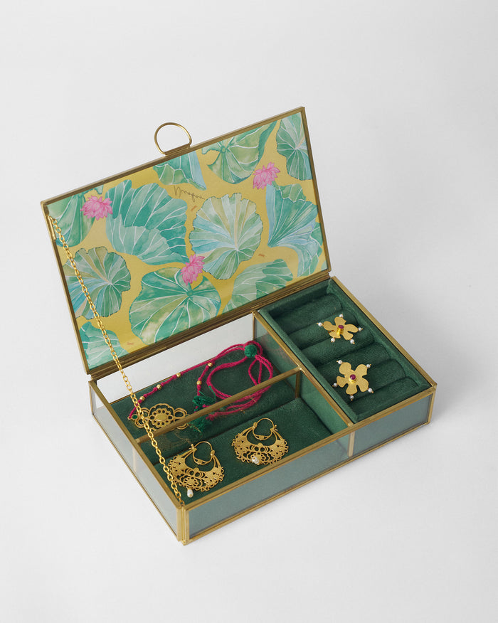 Open Lilly pond jewellery box filled with gold jewellery.