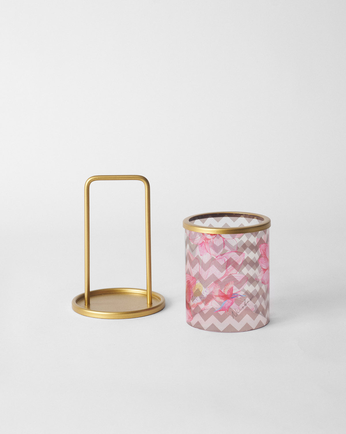 Float lantern parts with a brass handle and base beside the printed shade.