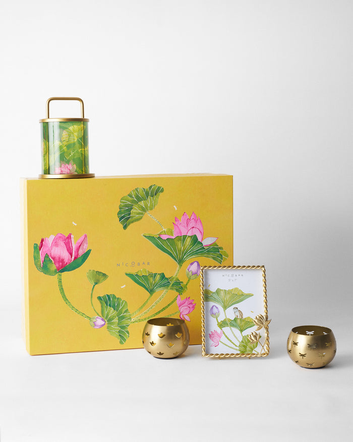 Lotus Grove gift set with yellow box, lantern, frame and gold votives.