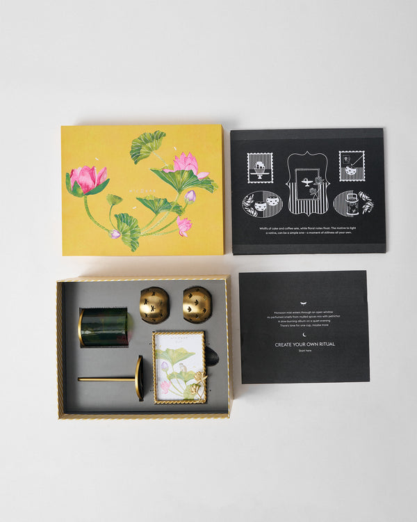 The open box beside printed cards