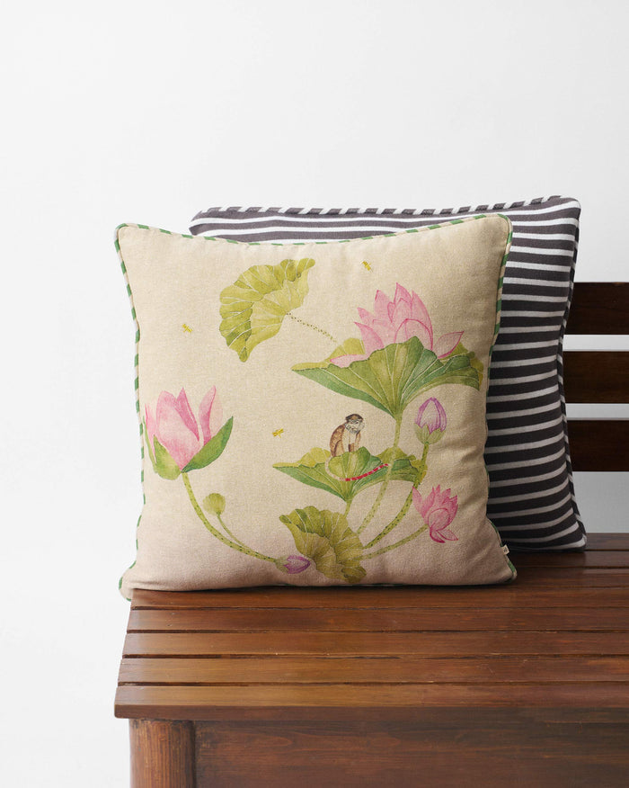 Beige Lotus cushion cover with pink lotuses, leaves and a small monkey.
