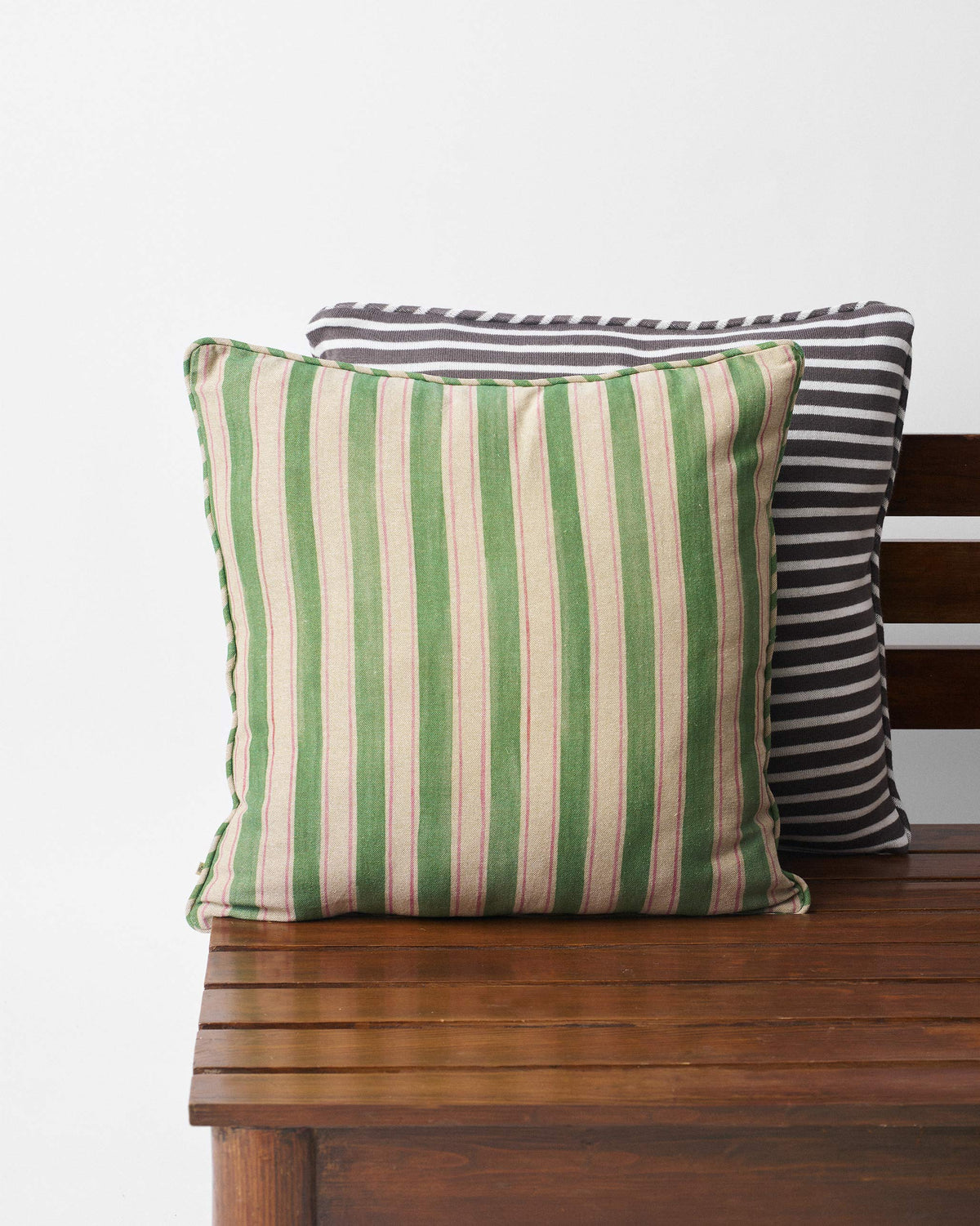 Back of the Lotus cushion cover showing sage and cream vertical stripes.