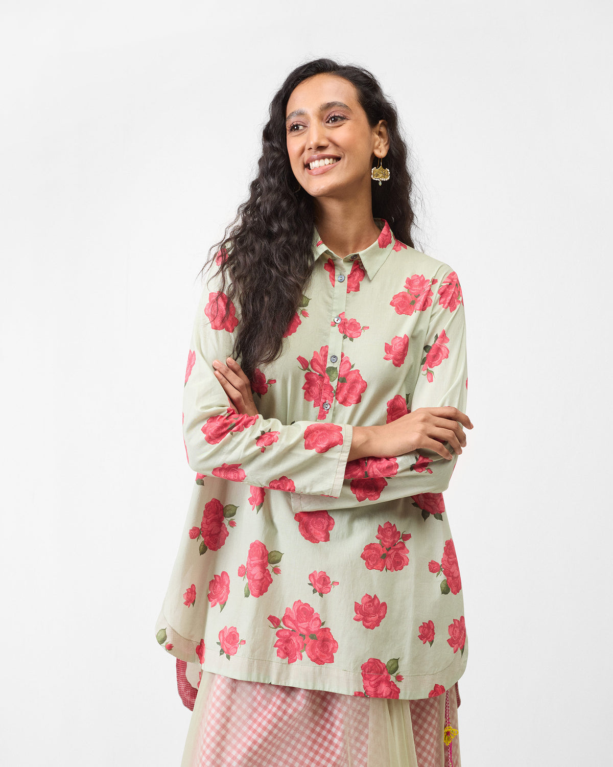 Person wearing a mint High Low Shirt with a watermelon rose print.