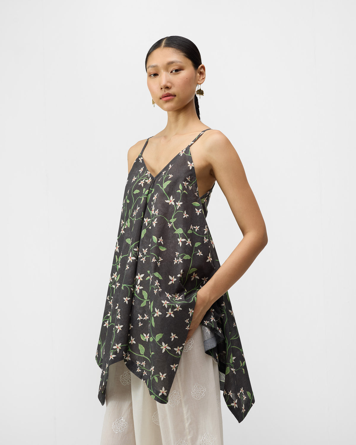 Charcoal Handkerchief Top with a jasmine print and a flared silhouette.