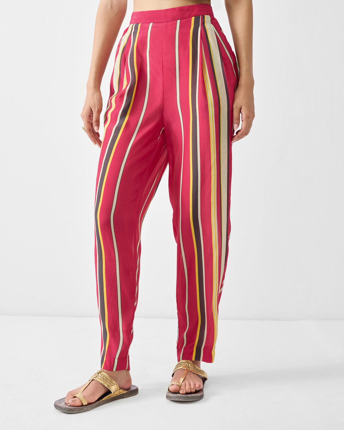 Person wearing Narrow pants in a pink stripe print.