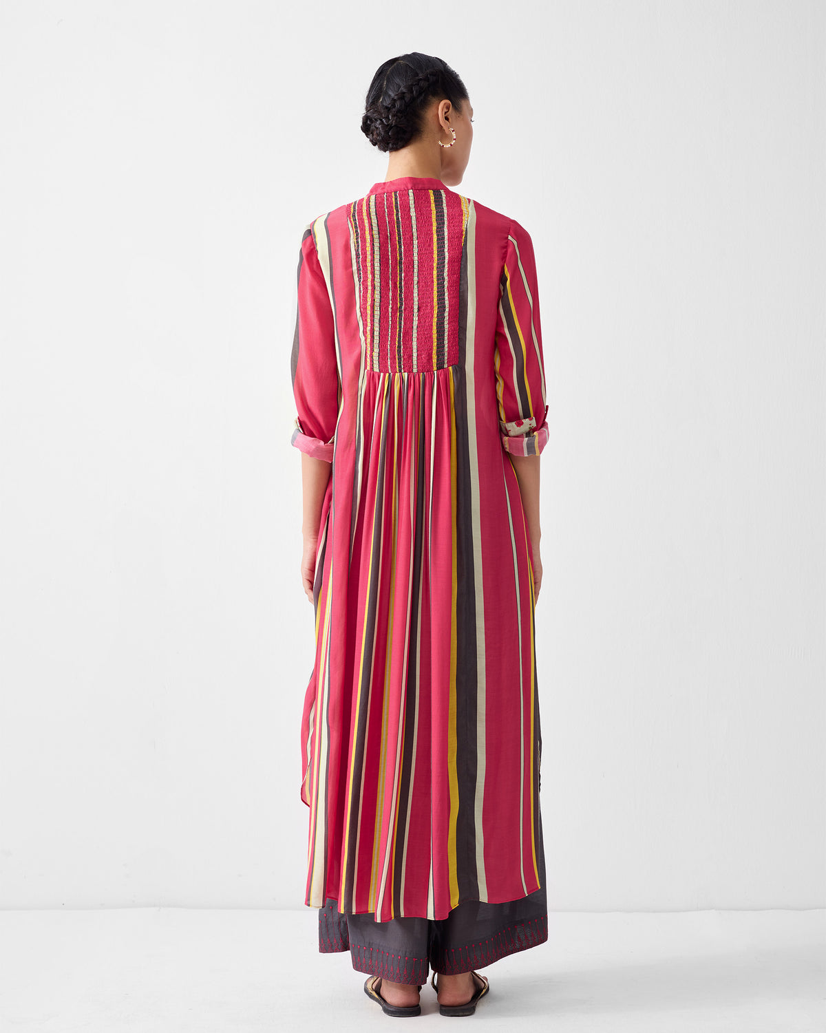 Back of a multicolor striped kurta with a smocked yoke.