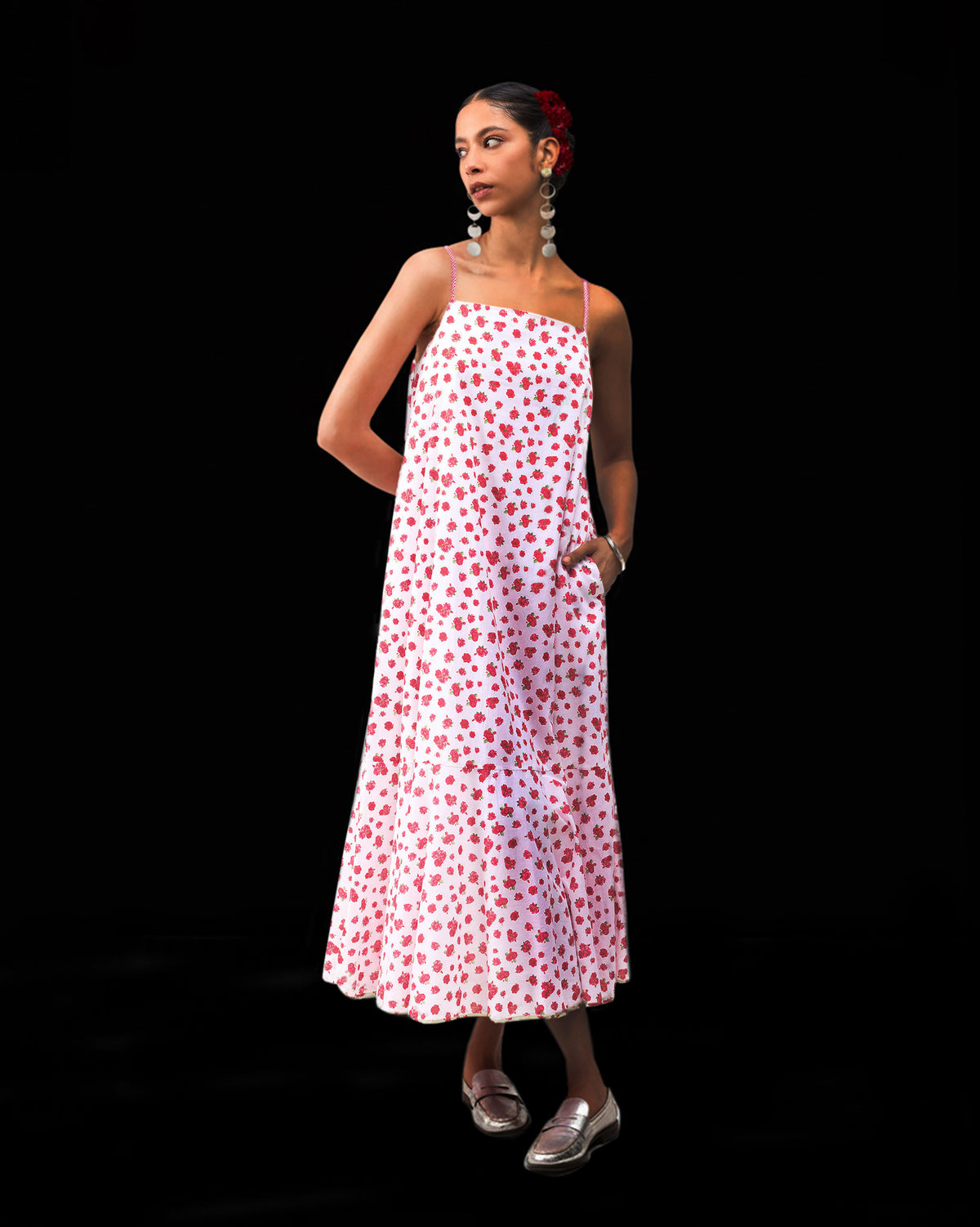 Person wearing a white watermelon-print Kimsuka Dress with a side pocket.
