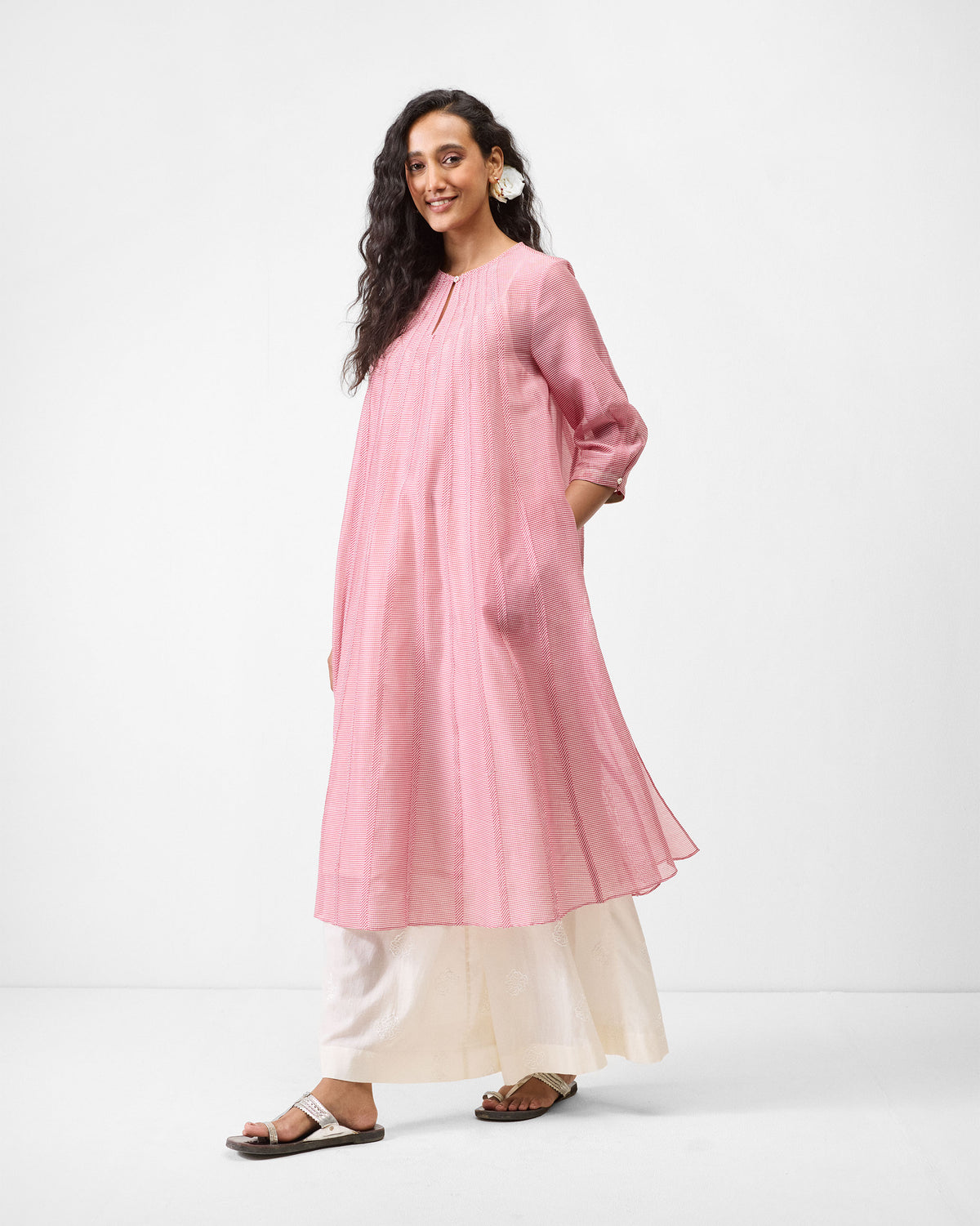 Full-length front view of a pink Pattaya kurta with puff sleeves.