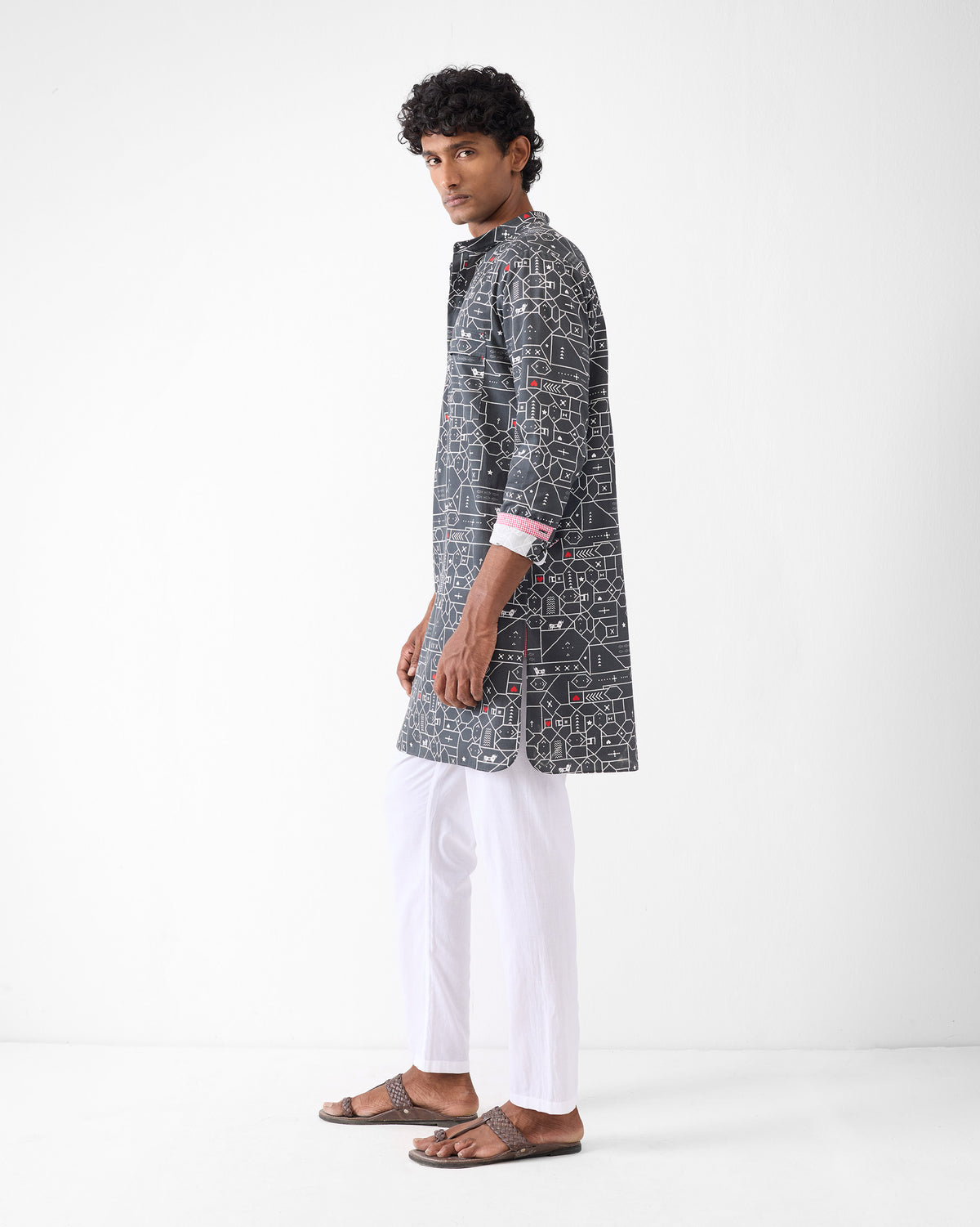 Side view of a black and grey Galle Kurta with a geometric print.